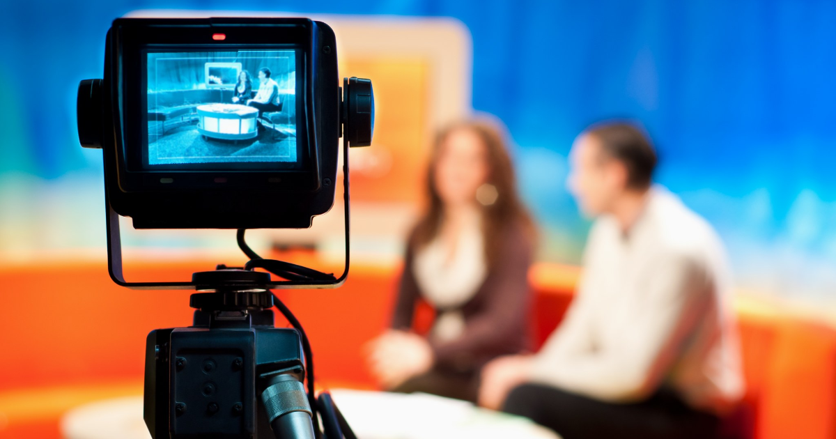 Close-up of a video camera filming a TV show. (Photo: Shutterstock)